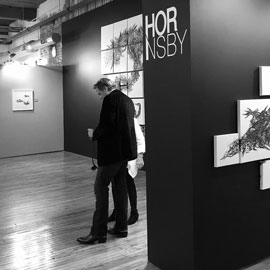 An attendee talks with Hornsby