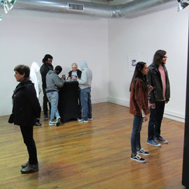 Attendees engaging with Hornsbys Fracture tiles